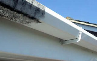 Gutter and fascia before and after clean image